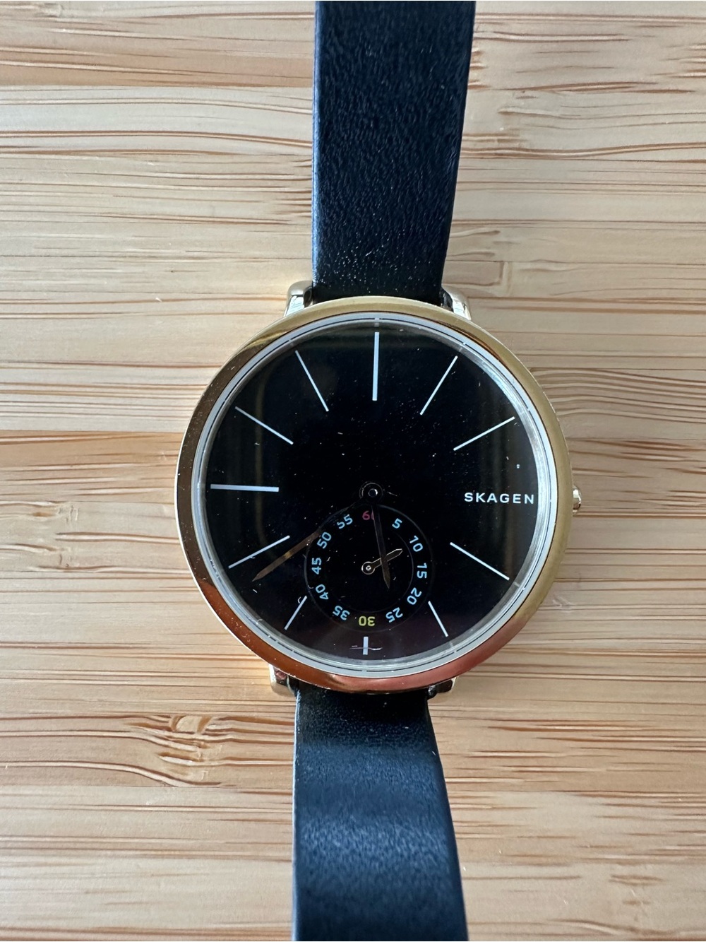 Skagen Women’s Black and Gold Watch - Needs new battery